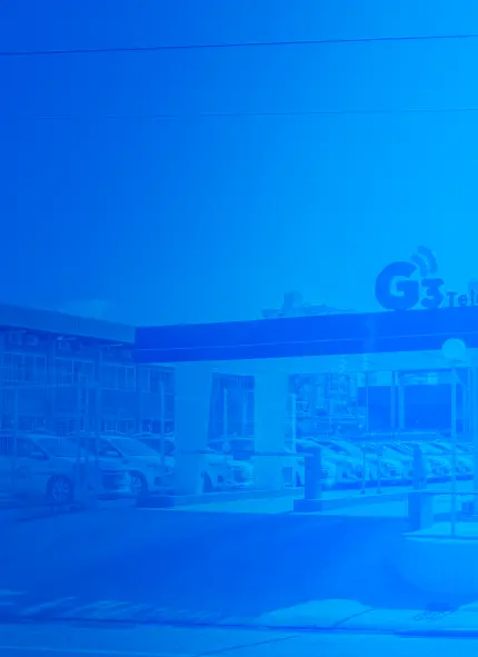 Imagem da sede administrativa da G3 Telecom, com o logotipo da empresa em destaque.